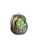 Turquoise and feather pendant