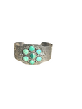 Harvey era whirling log cluster cuff